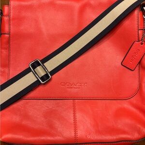 Coach Red Leather Messenger Bag with Navy and Tan adjustable strap.